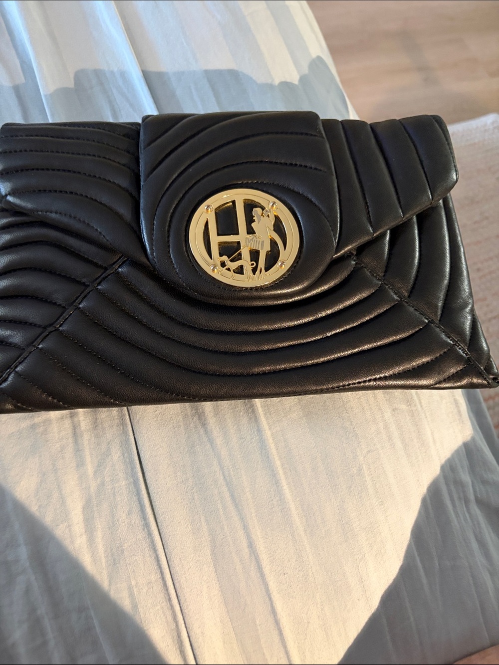 HENRI BENDEL Black Quilted Clutch with Gold Logo Hardware